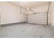 A two car garage with a white door at 426 Vera Park Pl, Alpharetta, GA 30022