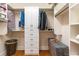 Organized walk-in closet with built in storage shelves, drawers, and hanging areas at 426 Vera Park Pl, Alpharetta, GA 30022