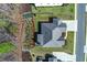 An aerial view of a single Gathering home in a residential neighborhood showcasing landscaping at 432 Horizon Trl, Canton, GA 30114