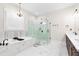 Elegant bathroom featuring a soaking tub, glass shower, and sleek marble tile floors at 432 Horizon Trl, Canton, GA 30114