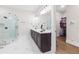 Luxurious bathroom with glass shower, double vanity, modern fixtures, and access to walk-in closet at 432 Horizon Trl, Canton, GA 30114