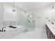 Gorgeous bathroom featuring a soaking tub, glass shower, and elegant finishes at 432 Horizon Trl, Canton, GA 30114