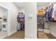Spacious walk-in closet with ample storage and convenient access to laundry room at 432 Horizon Trl, Canton, GA 30114