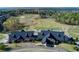 Scenic aerial view of the golf course clubhouse with lush landscaping at 432 Horizon Trl, Canton, GA 30114