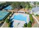 Aerial view of community pool and tennis courts surrounded by mature trees at 432 Horizon Trl, Canton, GA 30114