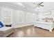 Spacious main bedroom with tray ceiling, hardwood floors, and plenty of natural light at 432 Horizon Trl, Canton, GA 30114