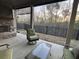 Covered back patio with an outdoor fireplace, outdoor seating, and a view of the grassy backyard at 432 Horizon Trl, Canton, GA 30114
