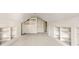 Attic with built-in shelving, a window, and carpeted floors at 51 Ivy Chase Ne, Atlanta, GA 30342