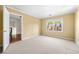 Well-lit bedroom with neutral tones and a large window at 51 Ivy Chase Ne, Atlanta, GA 30342