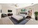 Spacious main bedroom with many windows and neutral decor at 51 Ivy Chase Ne, Atlanta, GA 30342
