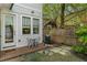Private backyard with a small patio, grill, and garden area, perfect for outdoor relaxation at 1054 Euclid Ne Ave, Atlanta, GA 30307