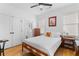 Bright bedroom with hardwood floors, a ceiling fan, and ample natural light at 1054 Euclid Ne Ave, Atlanta, GA 30307