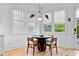 Cozy breakfast nook with modern lighting, natural light and seating for four at 1054 Euclid Ne Ave, Atlanta, GA 30307
