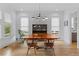 Elegant dining room with hardwood floors and a stylish mid-century modern chandelier at 1054 Euclid Ne Ave, Atlanta, GA 30307