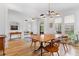 Bright dining room featuring hardwood floors, modern lighting, and ample natural light from the large window at 1054 Euclid Ne Ave, Atlanta, GA 30307