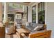 Cozy front porch with outdoor seating and a view of the surrounding greenery at 1054 Euclid Ne Ave, Atlanta, GA 30307