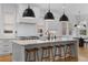Bright kitchen featuring a center island with seating, marble countertops, and pendant lighting at 1054 Euclid Ne Ave, Atlanta, GA 30307