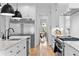 Modern kitchen with stainless appliances, marble countertops, and ample counter space at 1054 Euclid Ne Ave, Atlanta, GA 30307