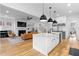 Open-concept living space with marble island, fireplace, and seamless flow at 1054 Euclid Ne Ave, Atlanta, GA 30307