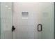 Stylish shower with unique vertical tile pattern and glass door at 1054 Euclid Ne Ave, Atlanta, GA 30307