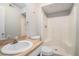 Bright bathroom with a stand up shower, toilet, and vanity at 1512 Daniel Ln, Lawrenceville, GA 30046