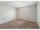 Cozy carpeted bedroom with neutral walls, ample natural light, and a comfortable atmosphere at 1512 Daniel Ln, Lawrenceville, GA 30046