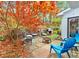 Backyard patio area features a grill, fire pit and chairs perfect for outdoor entertaining at 3075 Camden Way, Alpharetta, GA 30005