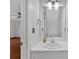 Bathroom features a single sink vanity and a framed mirror at 3075 Camden Way, Alpharetta, GA 30005