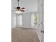 Bright bedroom with white trim and ceiling fan at 3075 Camden Way, Alpharetta, GA 30005