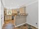 Traditional style kitchen with granite countertops and a mosaic backsplash at 3075 Camden Way, Alpharetta, GA 30005