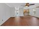 Open-concept living area with hardwood floors and easy access to the kitchen at 3075 Camden Way, Alpharetta, GA 30005