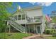 View of house with a raised deck and outdoor stairs at 4783 Deer Chase, Powder Springs, GA 30127
