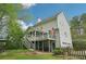 Charming home featuring a spacious back deck and a well-maintained yard, perfect for outdoor gatherings at 4783 Deer Chase, Powder Springs, GA 30127