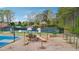 Playground with swings and slides, next to tennis courts and surrounded by trees at 4783 Deer Chase, Powder Springs, GA 30127