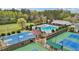 Aerial view featuring a pool, basketball and tennis courts providing ample recreational space at 4783 Deer Chase, Powder Springs, GA 30127
