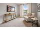 Relaxing bedroom features lots of light, neutral walls, and sitting area at 5607 Hislop Ln # 80, Mableton, GA 30126