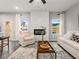 Cozy living room with a modern fireplace, plush seating, and stylish area rug at 5607 Hislop Ln # 80, Mableton, GA 30126