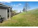 Spacious backyard with play structure offers outdoor fun and entertainment at 3478 Crayton Glen Way, Buford, GA 30519