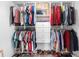 Organized closet featuring shelves and hanging rods for efficient clothing and shoe storage at 3478 Crayton Glen Way, Buford, GA 30519