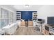 Bright home office with built-in shelving and drawers, and neutral flooring at 3478 Crayton Glen Way, Buford, GA 30519