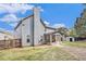 Exterior shot of the backyard with a covered patio and privacy fence at 415 Damascus Ct, Fairburn, GA 30213