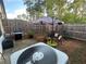 Spacious backyard with grill, patio, and seating area at 61 N Auburn Landing Pl, Auburn, GA 30011