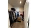 Walk-in closet featuring an organized space with plenty of hanging storage at 61 N Auburn Landing Pl, Auburn, GA 30011