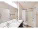 The bathroom has double sinks and a shower over tub with a shower curtain at 821 Ralph Mcgill Ne Blvd # 3337, Atlanta, GA 30306