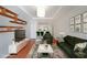 Cozy living room with modern lighting, stylish decor, and comfortable seating arrangement at 821 Ralph Mcgill Ne Blvd # 3337, Atlanta, GA 30306