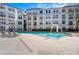 Beautiful community pool and lounge chairs, with a fountain feature at 821 Ralph Mcgill Ne Blvd # 3337, Atlanta, GA 30306