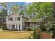Charming two-story home with black shutters and professionally landscaped front yard at 1244 Arden Sw Dr, Marietta, GA 30008