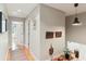 Upstairs hallway with hardwood floors, neutral paint and decor at 1244 Arden Sw Dr, Marietta, GA 30008