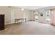 Open floor plan living room with carpet and natural light at 1244 Arden Sw Dr, Marietta, GA 30008