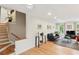 Spacious living room featuring hardwood floors, neutral walls, and large windows at 1244 Arden Sw Dr, Marietta, GA 30008